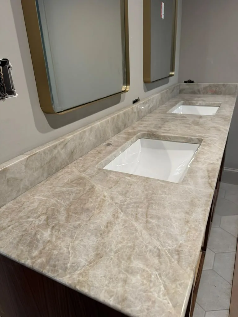 Bathroom marble vanity with an undermount sink